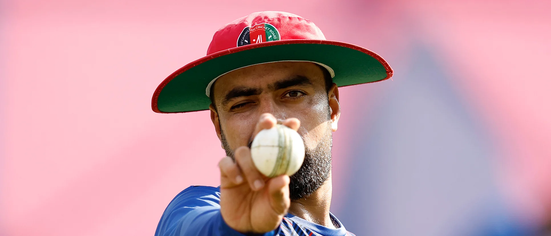 Logo of Rashid Khan Arman of Afghanistan bowls in the nets at HPCA Stadium in Dharamsala during a training session on October 06, 2023 in Dharamsala