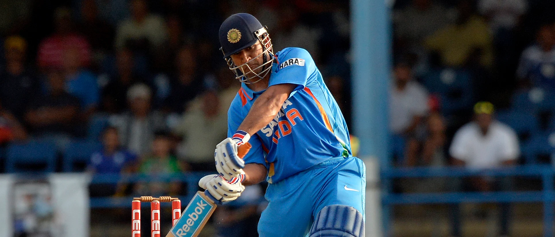 Logo of Dhoni hit two sixes and a four in the final over to complete a thrilling one-wicket win