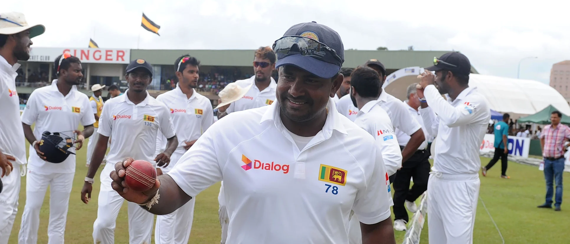 Logo of Rangana Herath celebrates the Test win