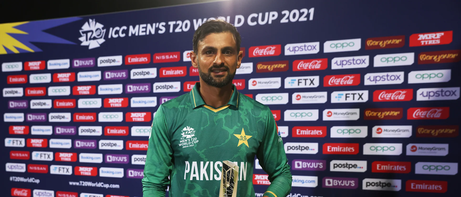 Logo of Shoaib Malik of Pakistan poses after being named Player of the Match following the ICC Men's T20 World Cup match between Pakistan and Scotland at Sharjah Cricket Stadium on November 07, 2021 in Sharjah, United Arab Emirates.