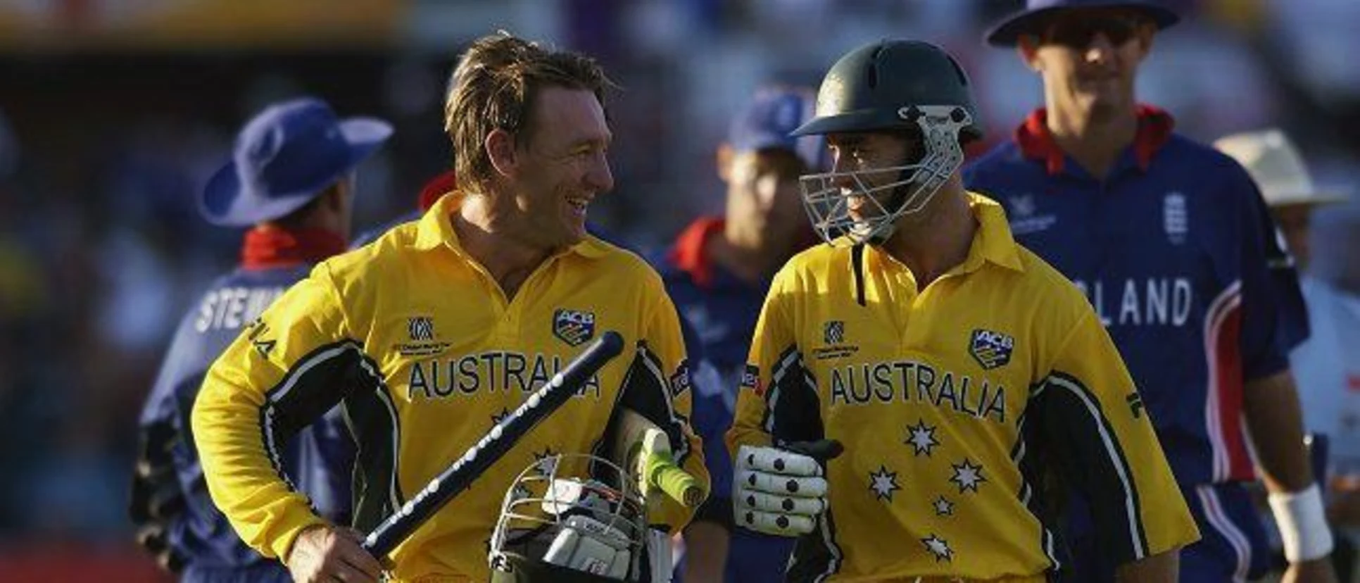 45073 Michael Bevan and Andy Bichel of Australia walk back to the pavilion