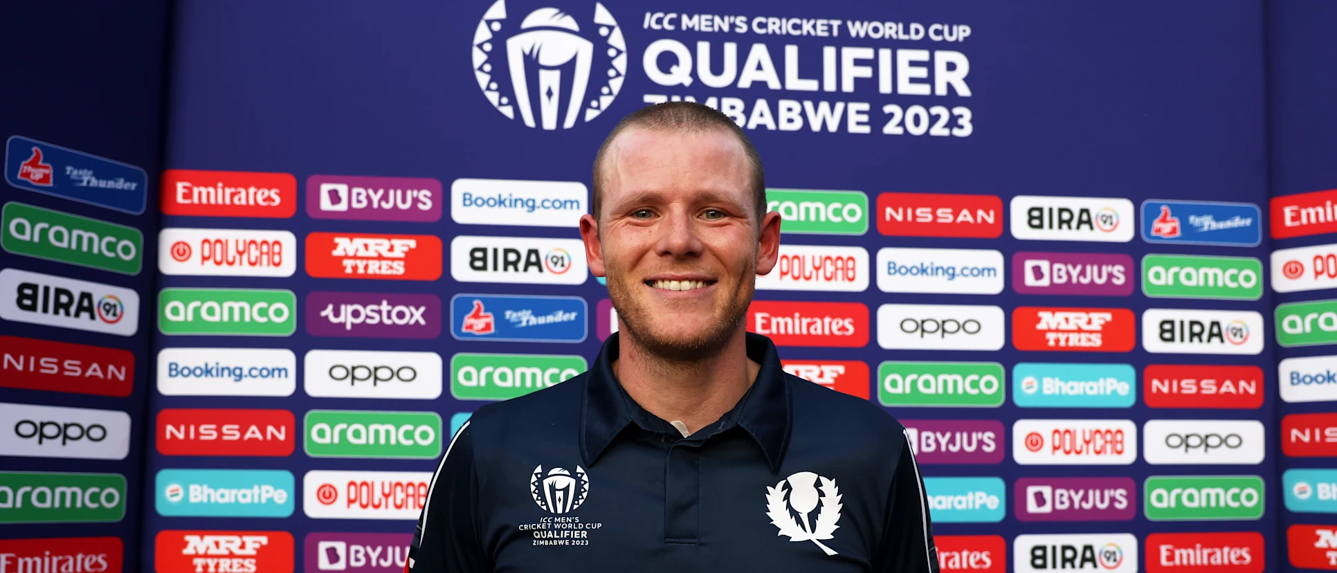 Logo of Michael Leask of Scotland poses after being named Player of the Match following the ICC Men's Cricket World Cup Qualifier Zimbabwe 2023 match between Ireland and Scotland at Queen’s Sports Club on June 21, 2023 in Bulawayo, Zimbabwe.