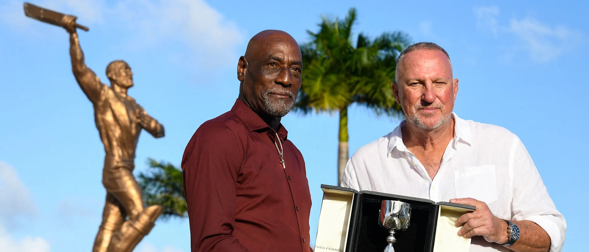 Sir Vivian Richards and Sir Ian Botham display the trophy
