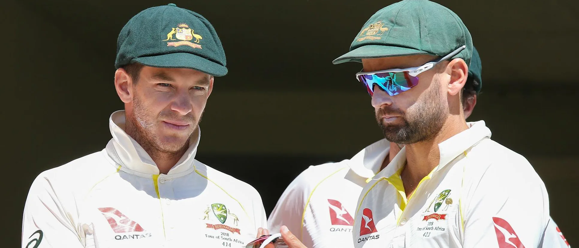Logo of Tim Paine and Nathan Lyon