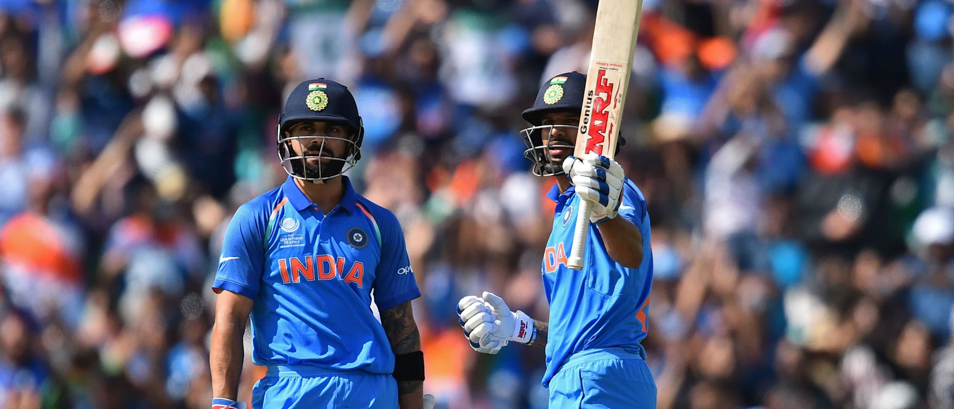 Logo of Virat Kohli and Shikhar Dhawan