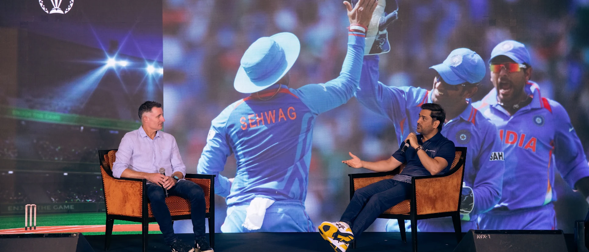 Logo of MS Dhoni and Mike Hussey discuss the 2011 World Cup final