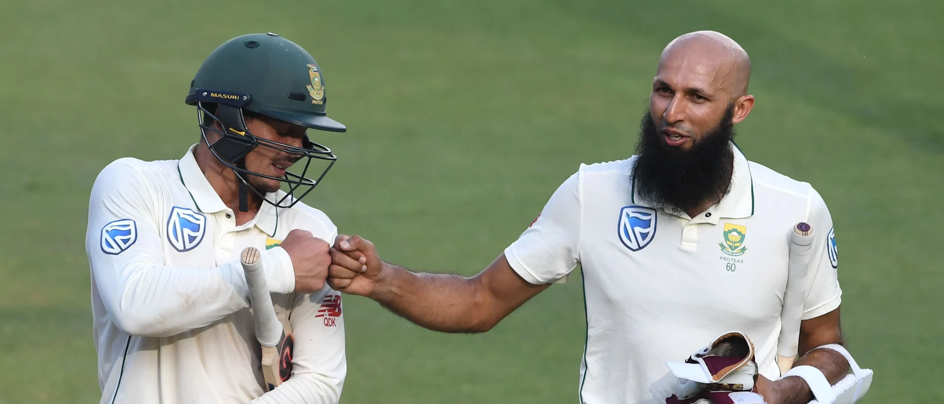 Logo of Quinton de Kock Hashim Amla