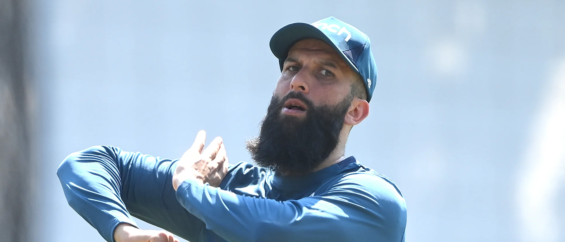 Logo of England player Moeen Ali in bowling action in the nets during England net session at Edgbaston
