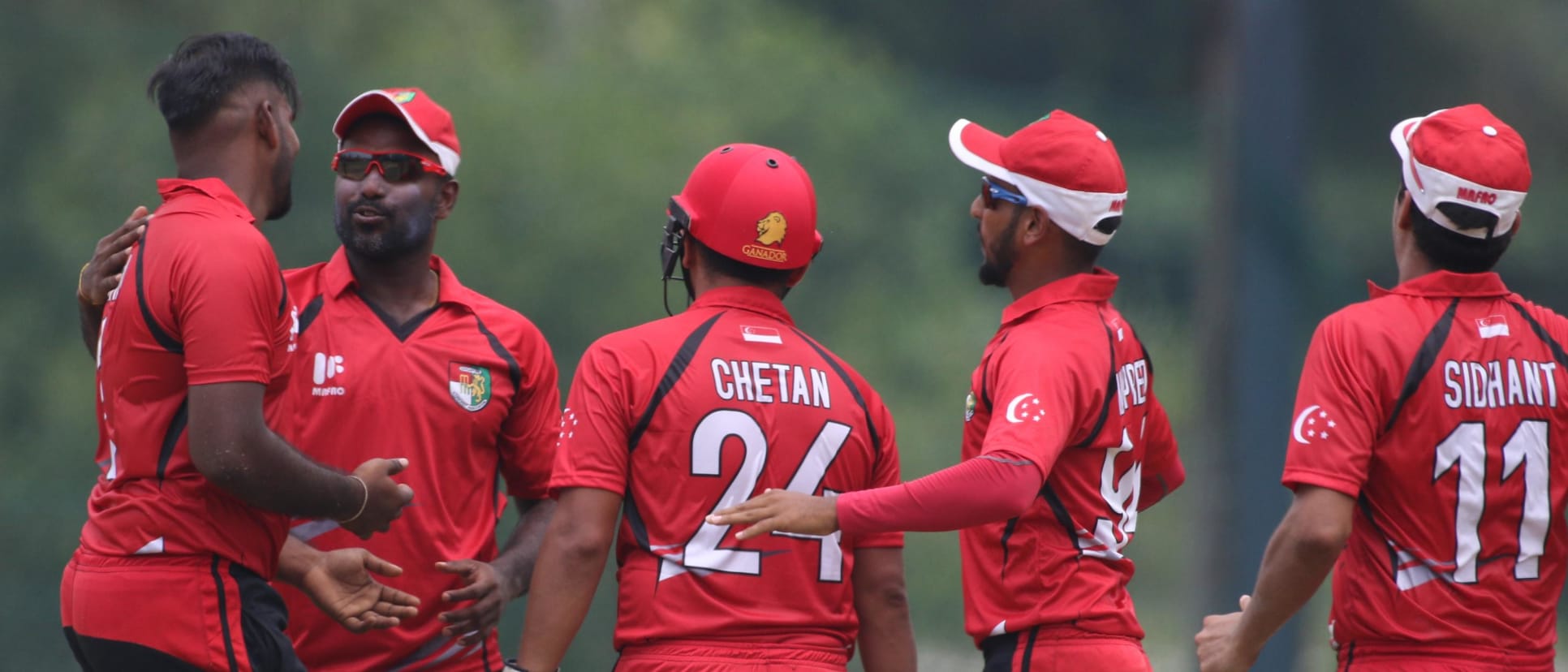 Singapore players celebrate