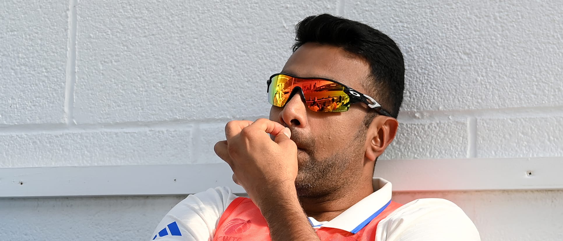 Ravichandran Ashwin of India sits in the dugout during day one of the ICC World Test Championship Final between Australia