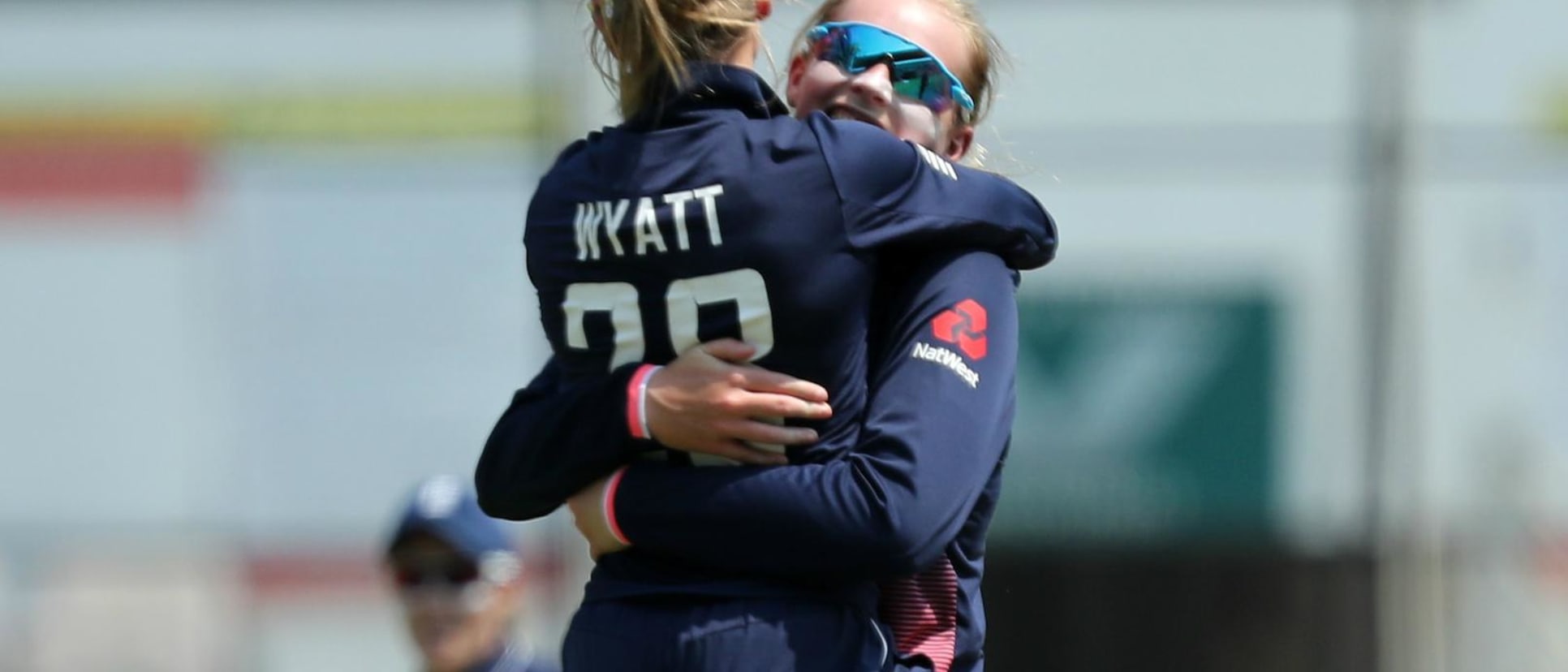 Sophie Ecclestone, the Player of the Match, celebrates one of her wickets with Danielle Wyatt