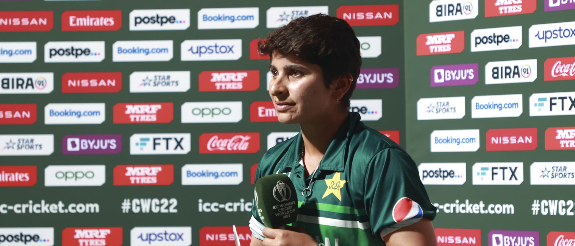 Nida Dar of Pakistan holds the Player of the Day award during the 2022 ICC Women's Cricket World Cup match between West Indies and Pakistan at Seddon Park on March 21, 2022 in Hamilton, New Zealand.