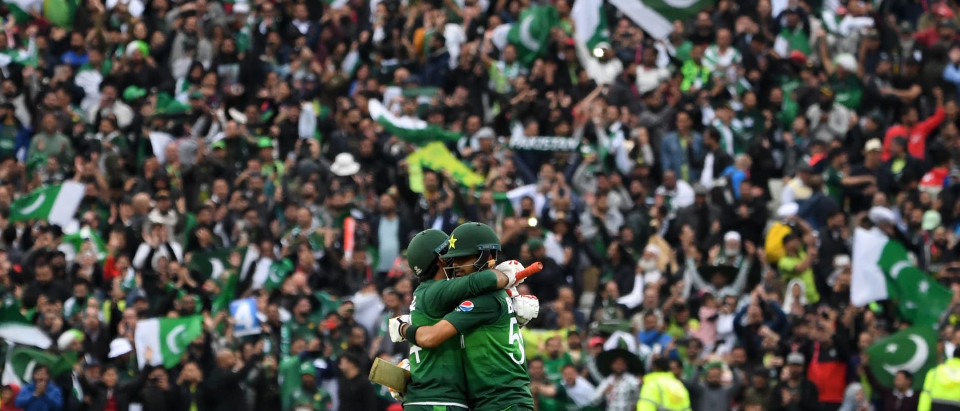 Babar Azam (R) and Pakistan's captain Sarfaraz Ahmed celebrate after victory in the 2019 Cricket World Cup group stage match between New Zealand and Pakistan at Edgbaston in Birmingham, central England, on June 26, 2019.