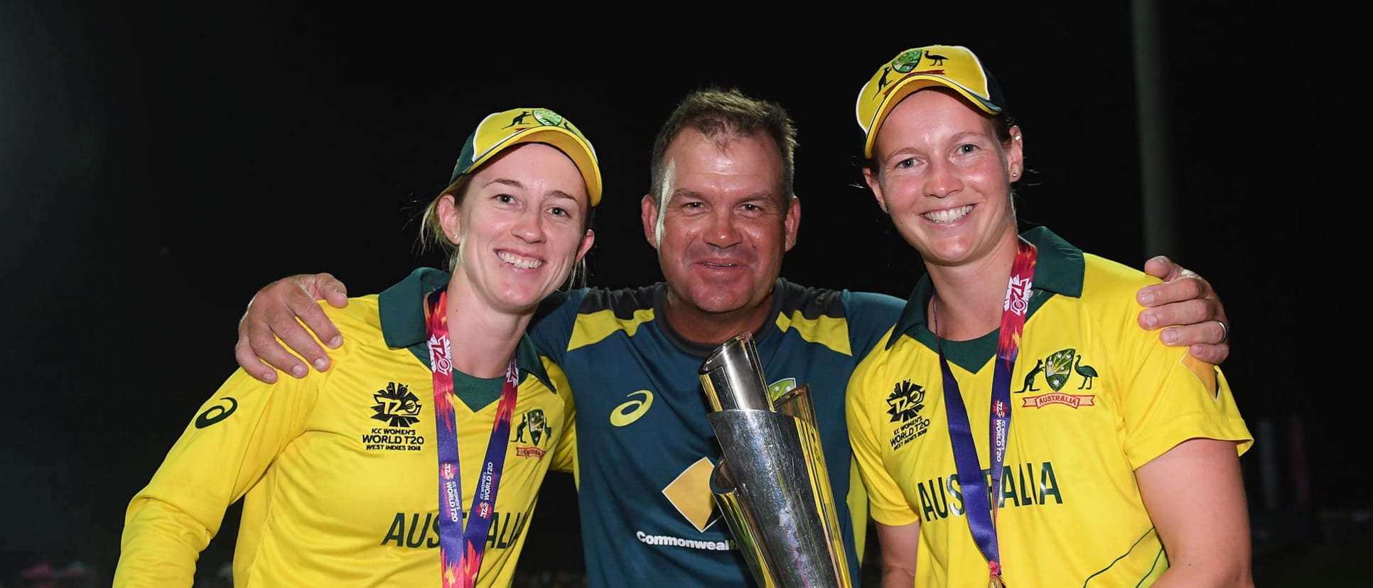 Haynes (left) alongside coach Matthew Mott and captain Meg Lanning after winning 2018 T20 World Cup