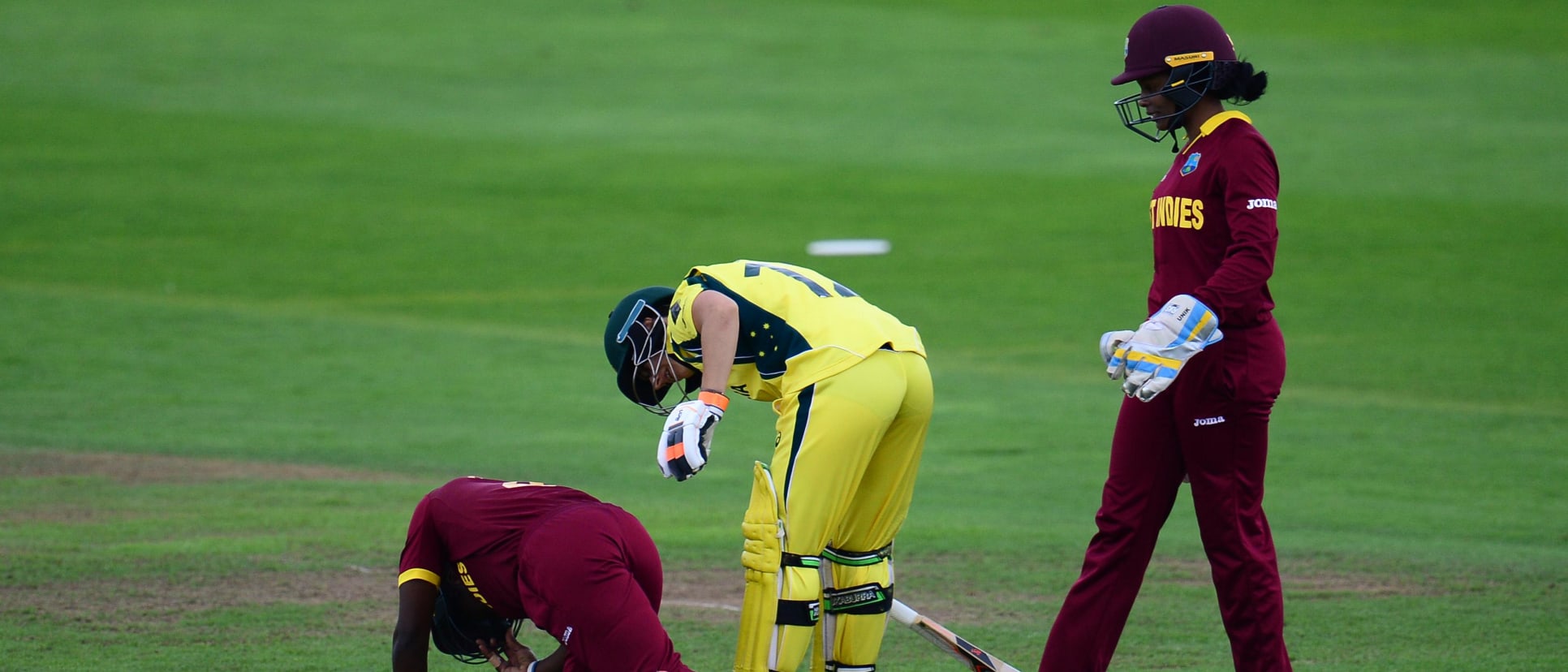 Shakera Selman of West Indies lies on the floor after being hit by a shot from Nicole Bolton