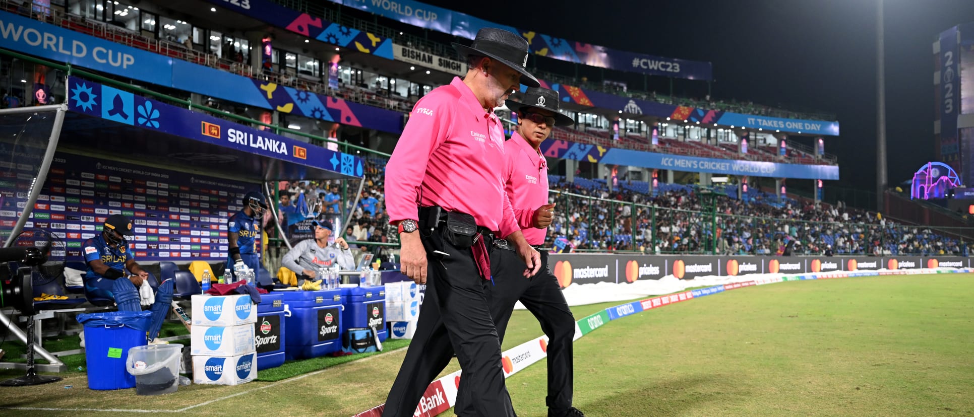 Umpires Richard Illingworth and Shahid Saikat walk onto the field during the ICC Men's Cricket World Cup India 2023 between South Africa and Sri Lanka at Arun Jaitley Stadium on October 07, 2023 in Delhi, India.