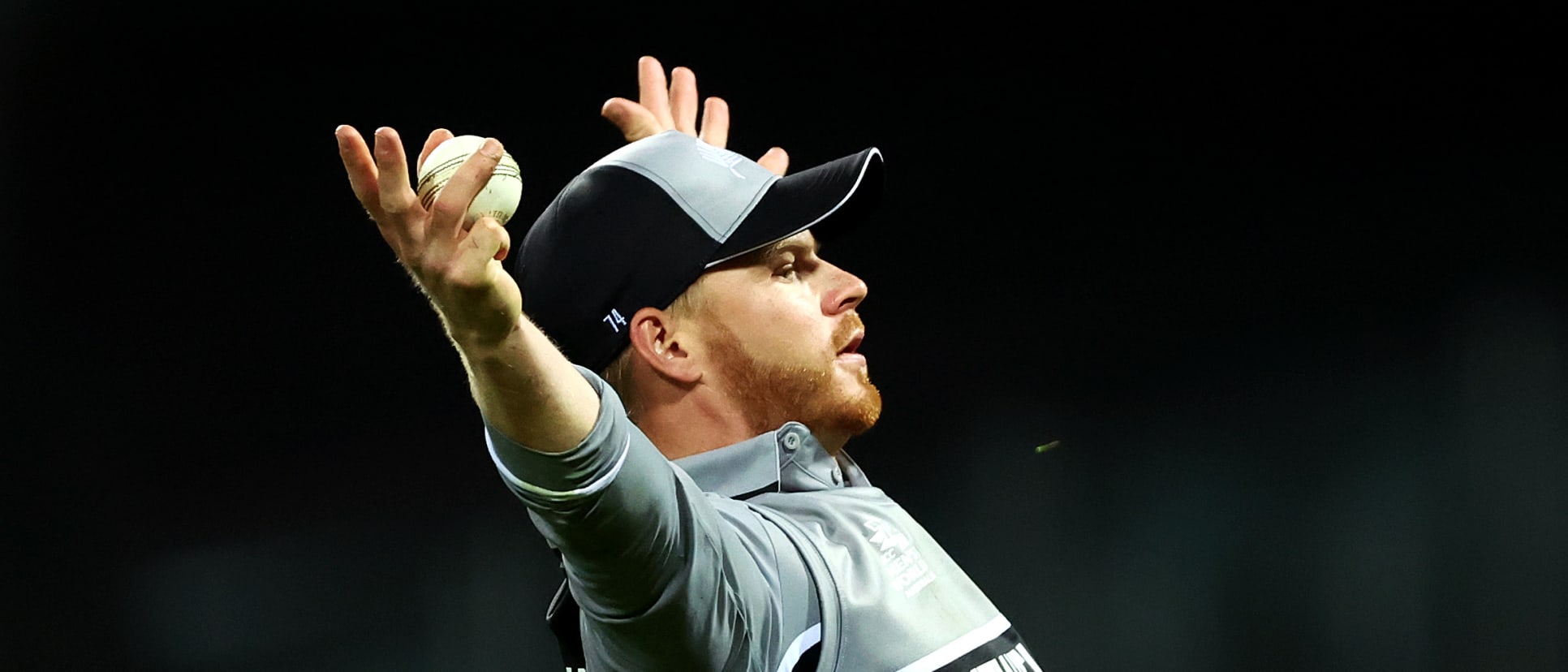 Glenn Phillips of New Zealand celebrates catching out Marcus Stoinis of Australia during the ICC Men's T20 World Cup match between Australia and New Zealand