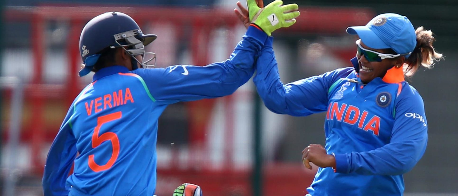 India wicketkeeper Sushma Verma celebrates with substitute fielder Veda who caught the catch to end the match during the ICC Women's World Cup match between England and India