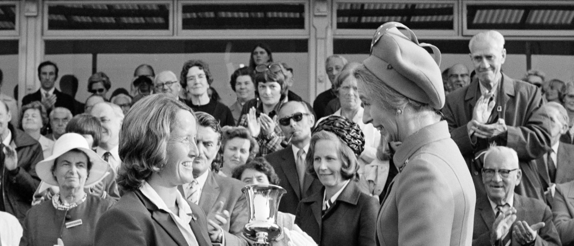 England captain Rachael Heyhoe-Flint is presented with the World Cup