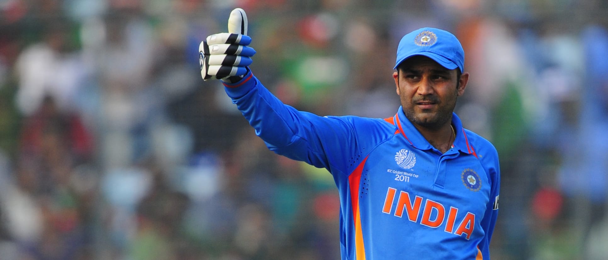 Virender Sehwag celebrates his century against Bangladesh.