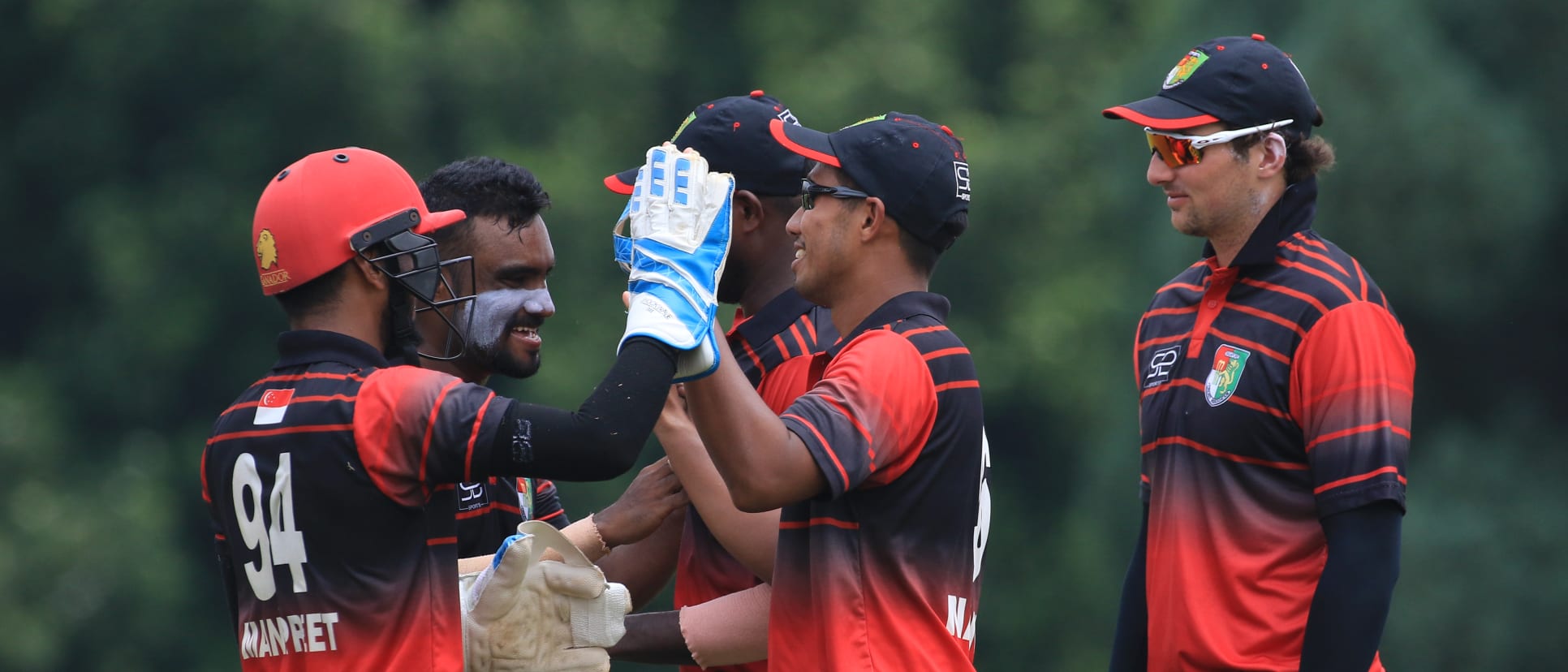 Singapore players celebrates upon dismissing Rodrigo Thomas of Canada.JPG