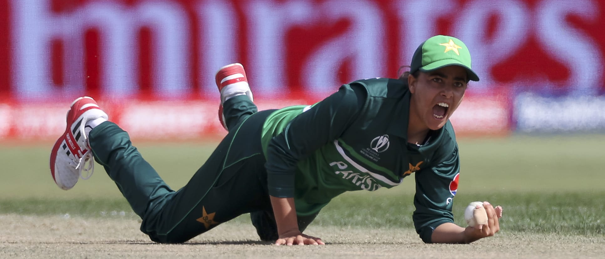 Ghulam Fatima of Pakistan takes a catch to dismiss Laura Wolvaardt of South Africa during the 2022 ICC Women's Cricket World Cup match between Pakistan and South Africa at Bay Oval on March 11, 2022 in Tauranga, New Zealand.