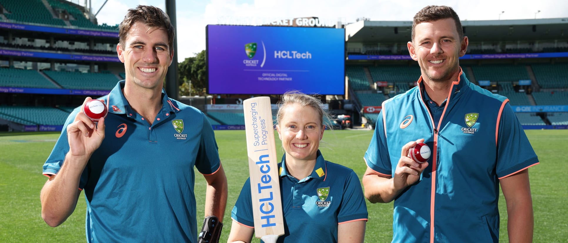 Cummins (left) alongside fellow Australia players Alyssa Healy and Josh Hazlewood in Sydney on Tuesday // Getty Images