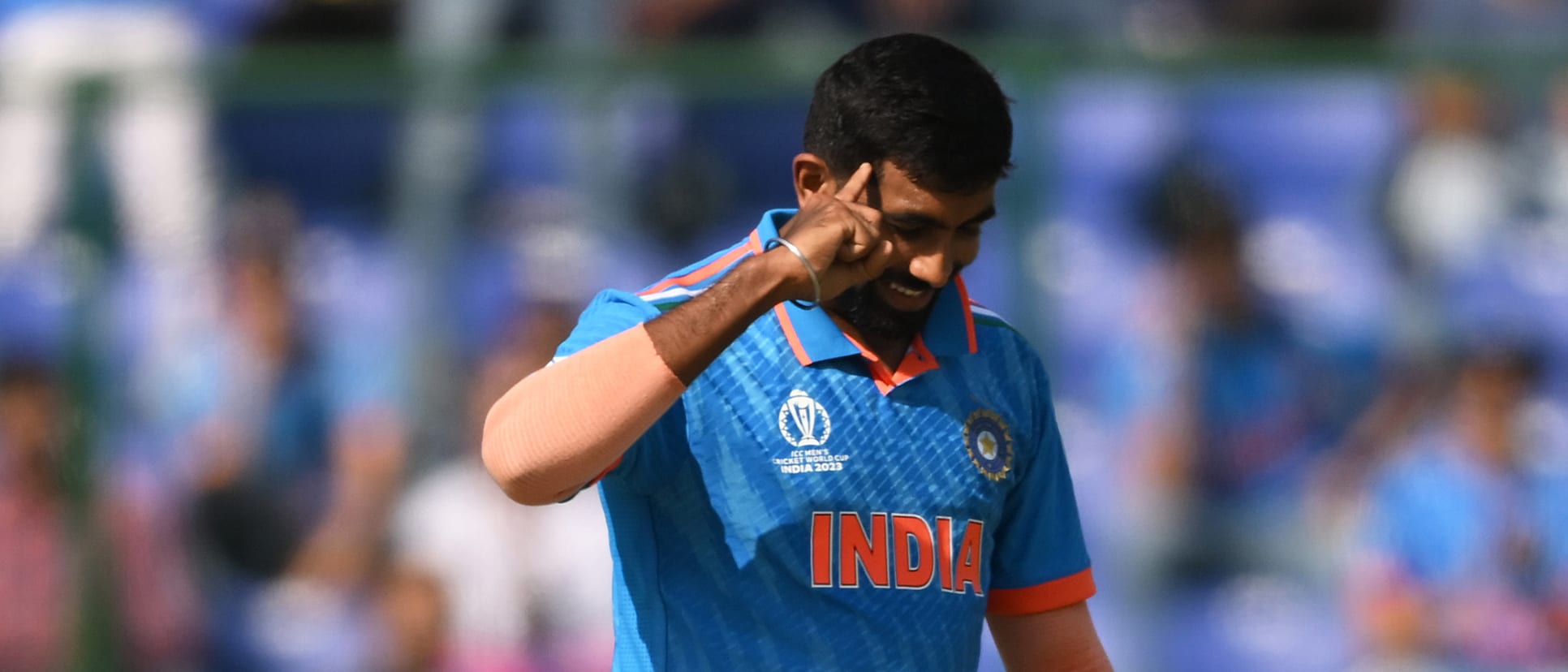 Jasprit Bumrah of India celebrates the wicket of Ibrahim Zadran of Afghanistan during the ICC Men's Cricket World Cup India 2023 between India and Afghanistan