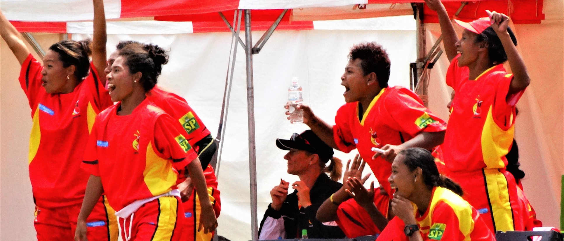 PNG Lewas celebrate the winning runs