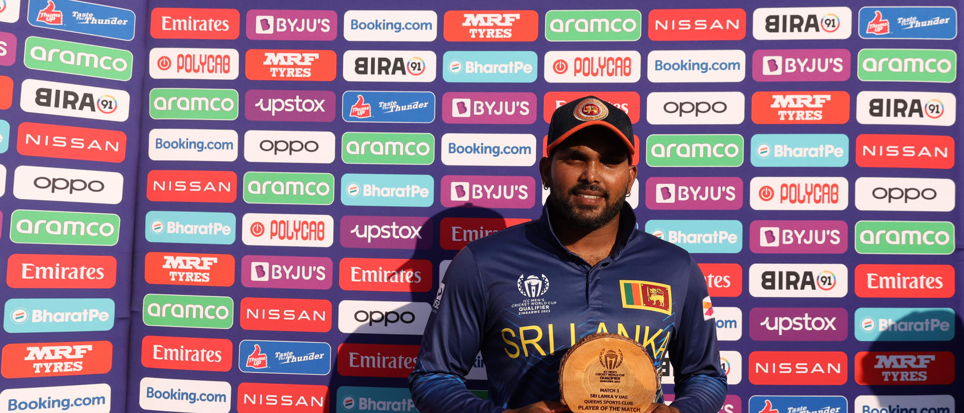 Wanindu Hasaranga of Sri Lanka poses after being named Player of the Match following the ICC Men's Cricket World Cup Qualifier Zimbabwe 2023 match between Sri Lanka and United Arab Emirates at Queen’s Sports Club on June 19, 2023 in Bulawayo, Zimbabwe.