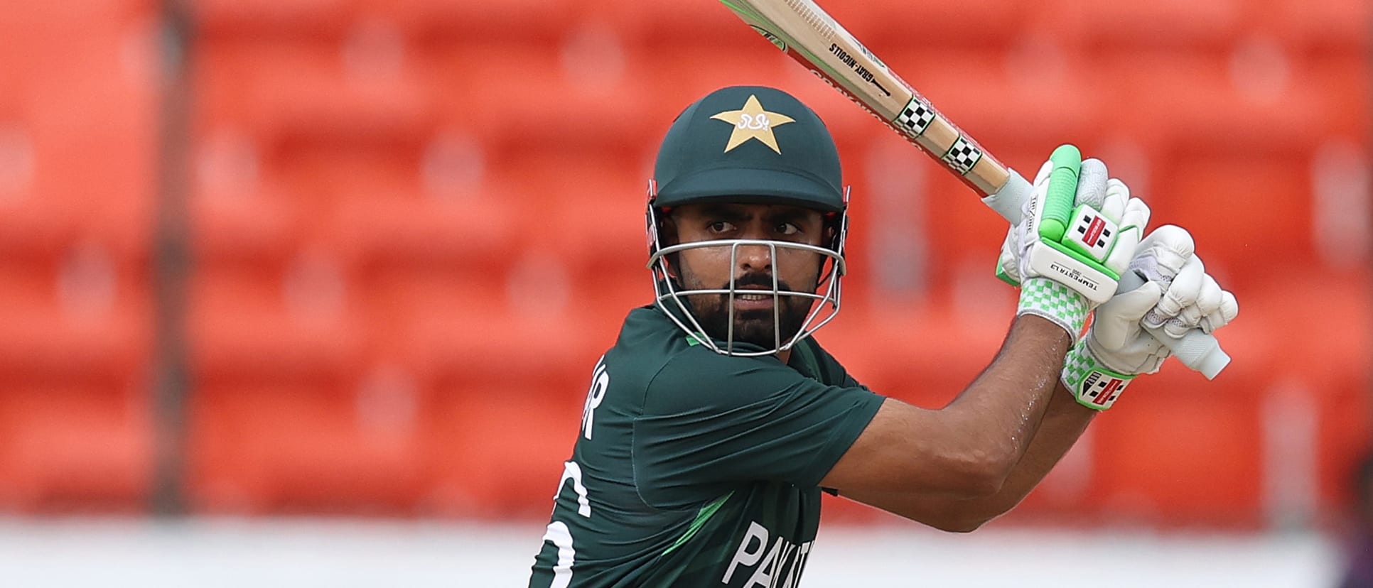 Babar Azam of Pakistan hits the ball towards the boundary during the ICC Men's Cricket World Cup India 2023 warm up match between New Zealand and Pakistan