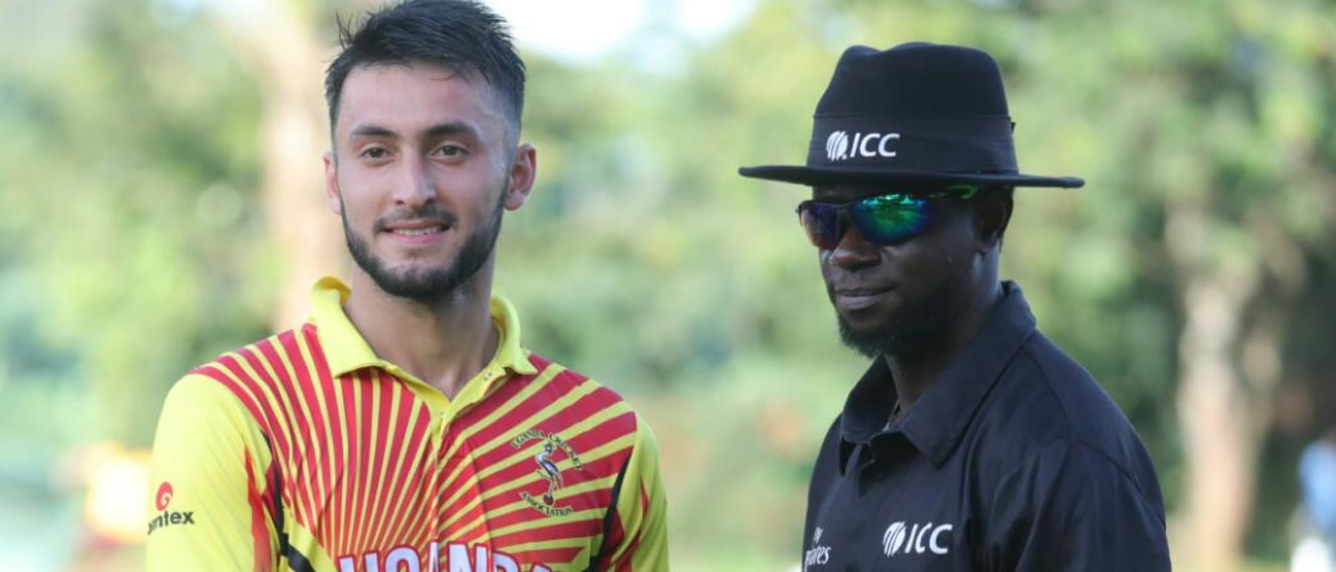 Player of the match Riazat Ali Shah receives his award from Nigerian umpire Kehinde Olanbiwonnu  (1)