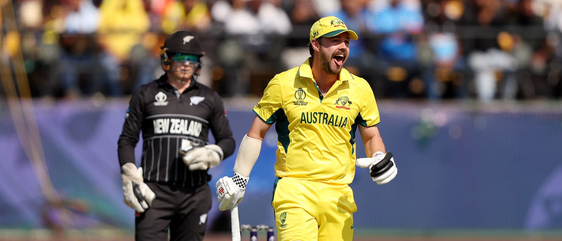 Travis Head of Australia celebrates after reaching his century after scoring 100 runs during the ICC Men's Cricket World Cup India 2023 Group Stage Match between Australia and New Zealand (2)