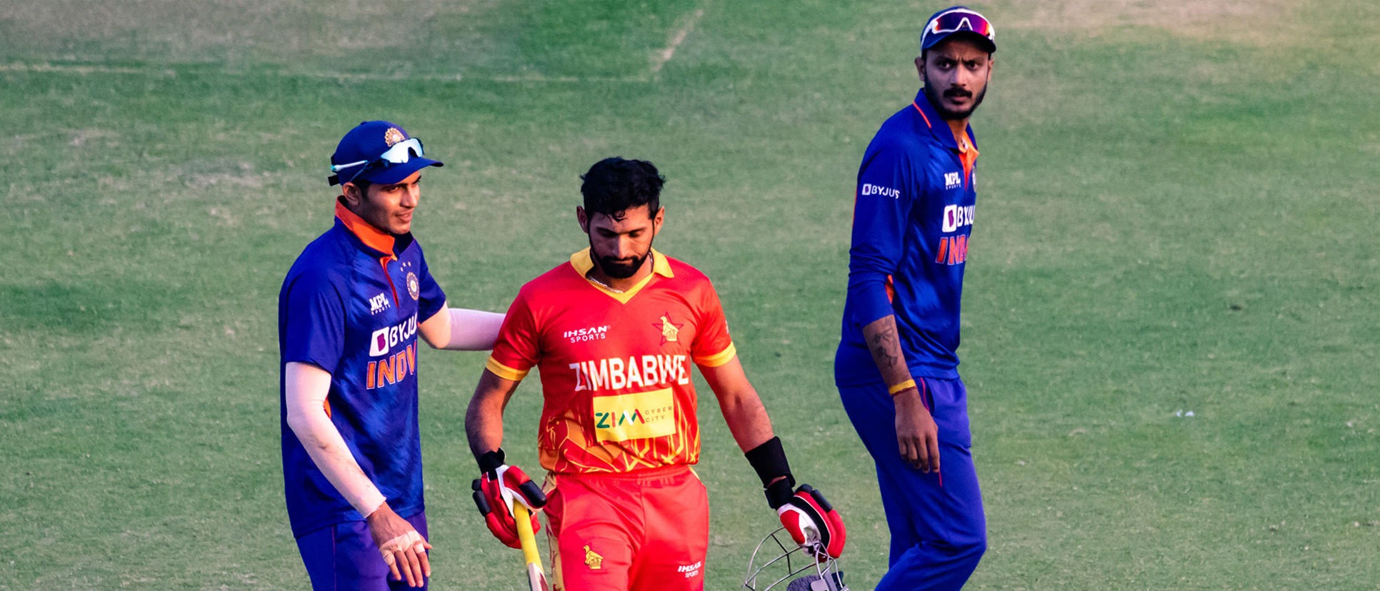 Sikandar Raza congratulated by India players after a starring knock in Harare.