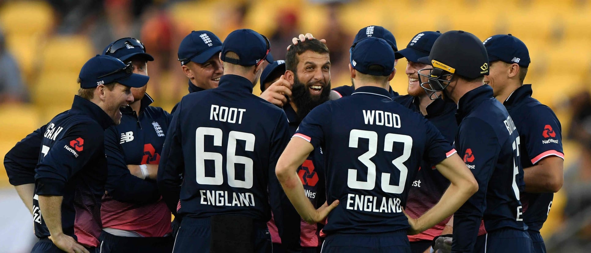 Moeen Ali celebrates with his teammates