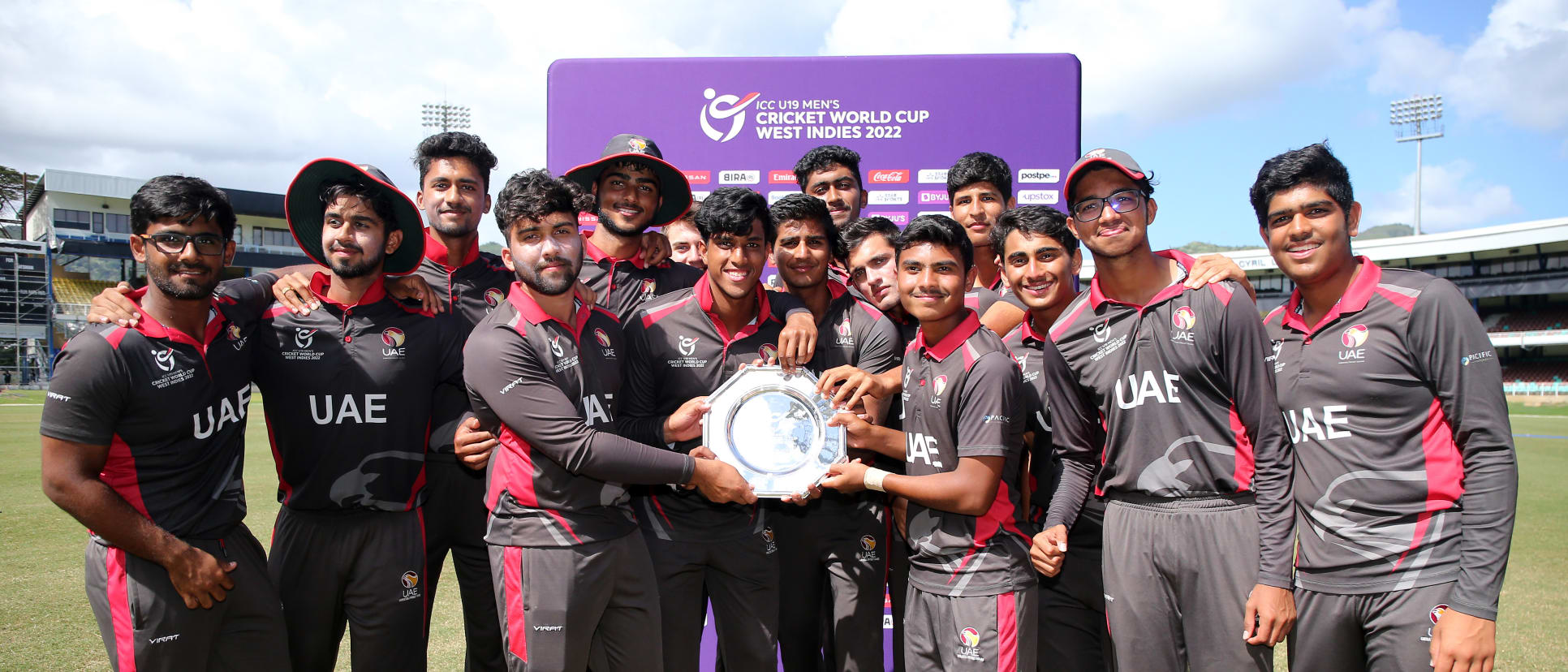 Players of United Arab Emirates celebrate with the Plate Trophy following the ICC U19 Men's Cricket World Cup Plate Final match between United Arab Emirates and Ireland at Queen's Park Oval on January 31, 2022 in Port of Spain, Trinidad And Tobago.