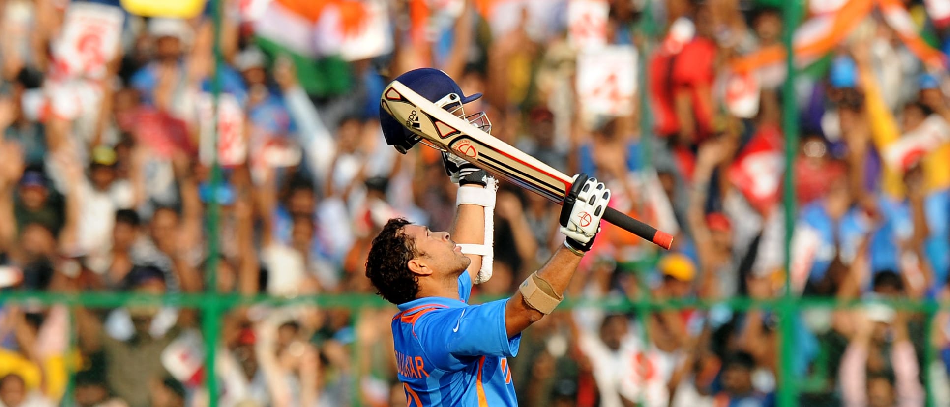 Sachin Tendulkar celebrates his century against England.
