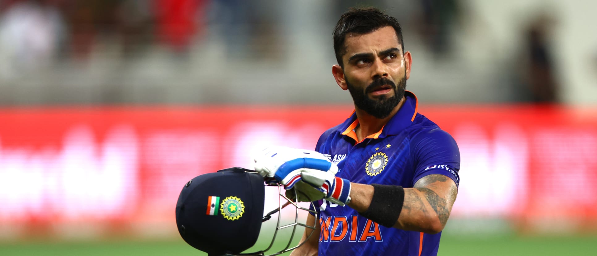 Virat Kohli of India leaves the field after being dismissed