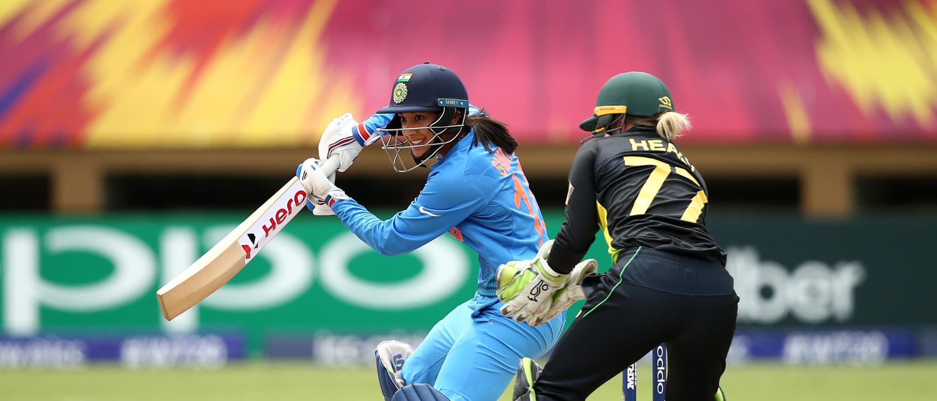 Smriti Mandhana of India bats with Alyssa Healy of Australia looking on during the ICC Women's World T20 2018 match between India and Australia at Guyana National Stadium on November 17, 2018 in Providence, Guyana.