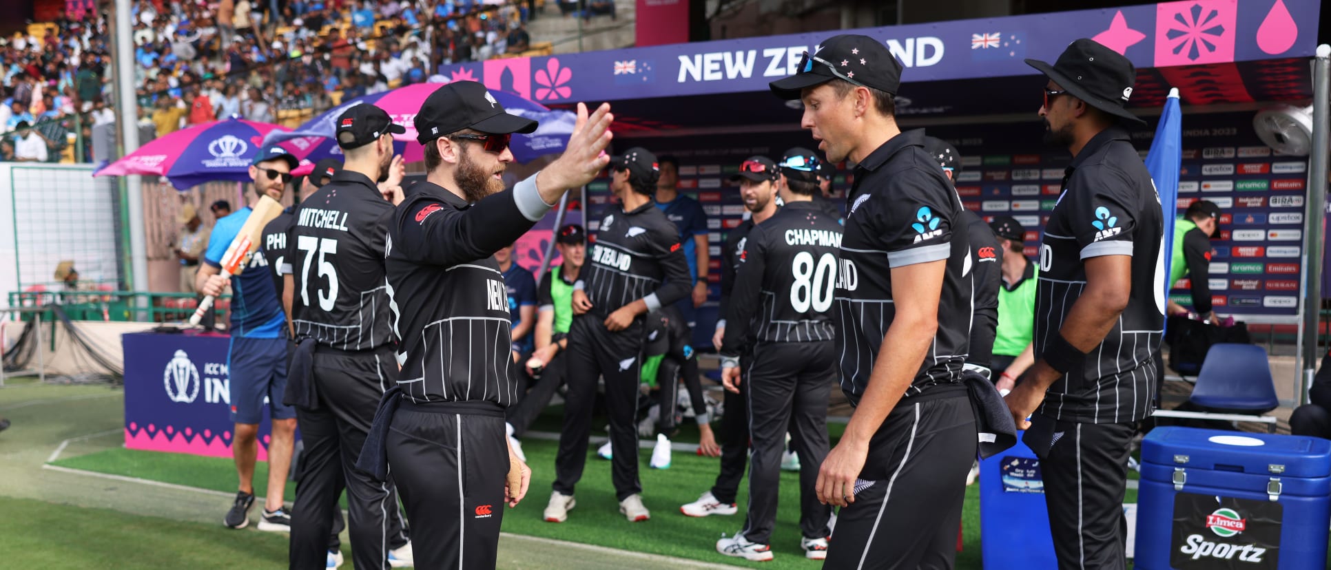 Kane Williamson and Trent Boult of New Zealand interactduring the ICC Men's Cricket World Cup India 2023 between New Zealand and Pakistan at M. Chinnaswamy Stadium on November 04, 2023 in Bangalore, India.