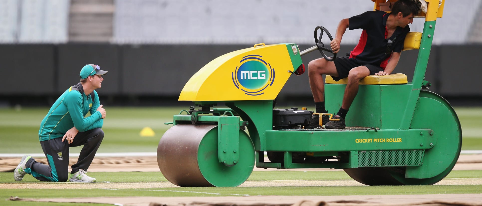 Smith looks on at the MCG pitch being prepared.jpg