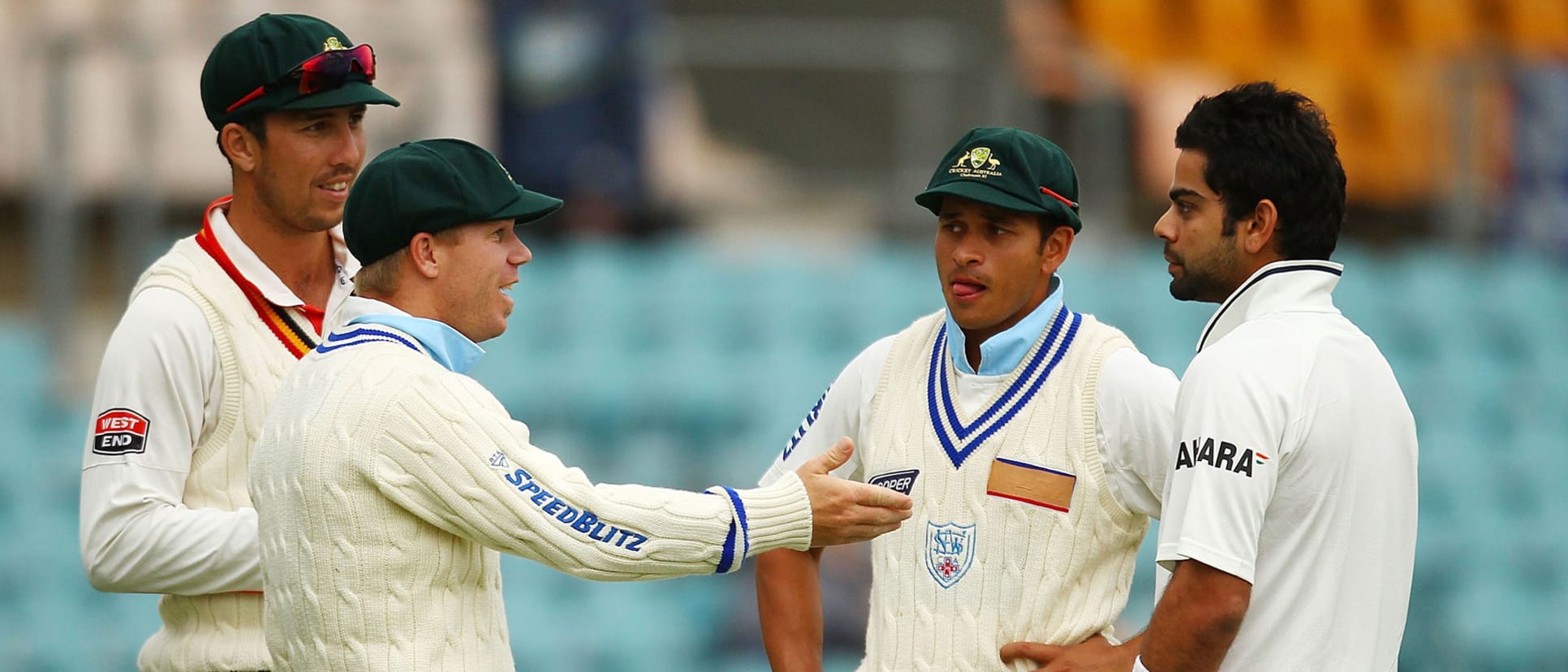 Warner and Khawaja chat with Virat Kohli during a tour game in Canberra in 2011 // Getty Images