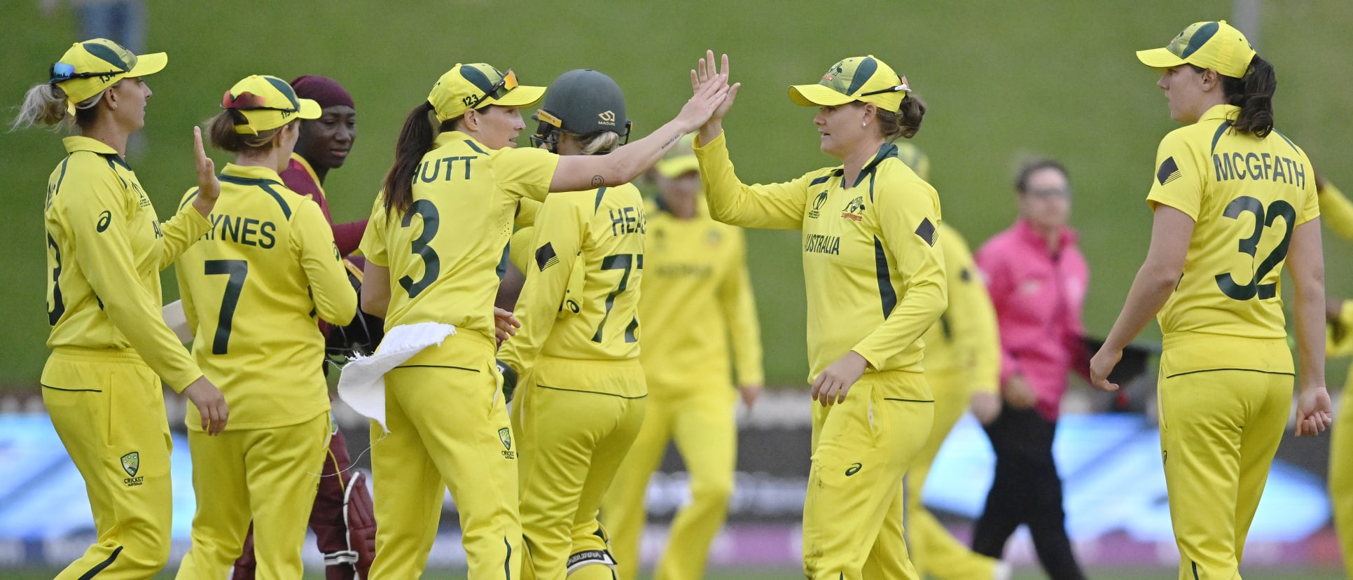 Jess Jonassen of Australia celebrates with teammate Megan Schutt after catching out Stafanie Taylor of the West Indies and to win the 2022 ICC Women's Cricket World Cup match between Australia and the West Indies at Basin Reserve on March 30, 2022.