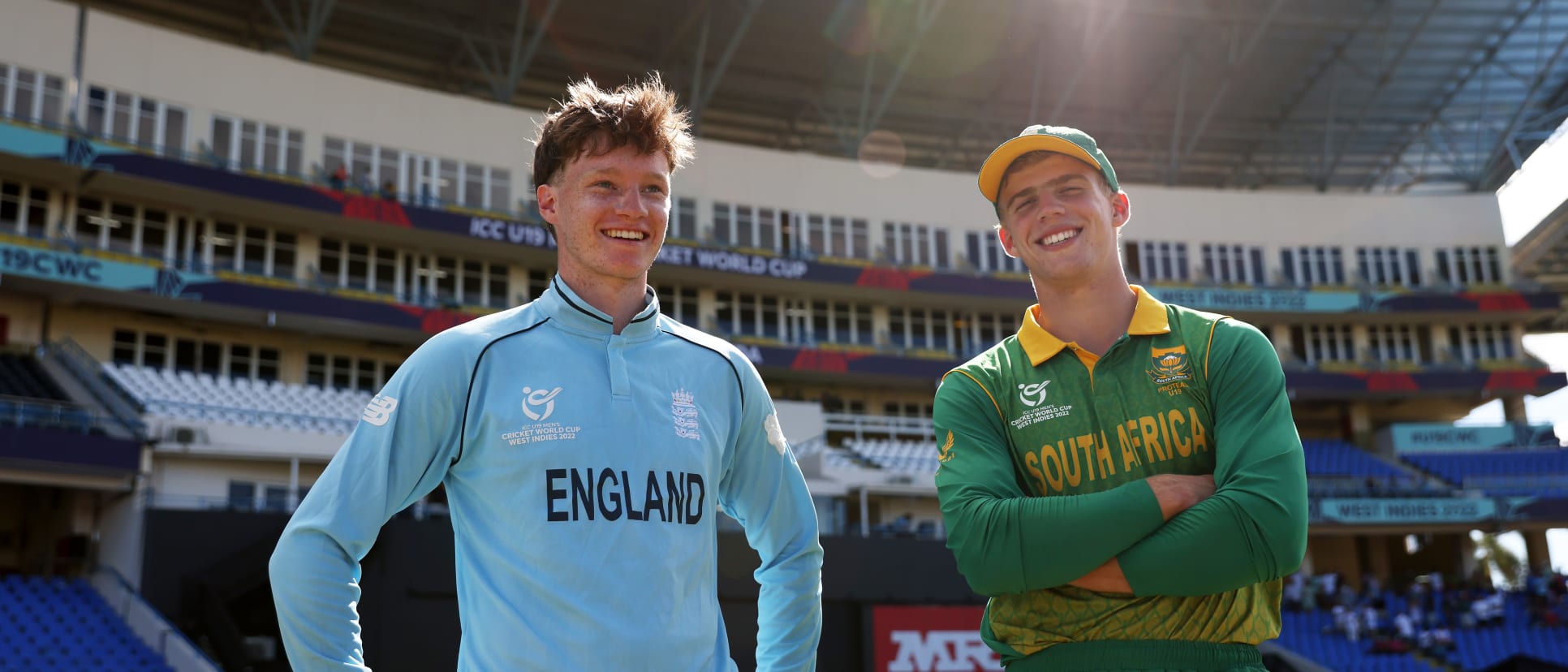 Tom Prest of England and George van Heerden of South Africa interact following the ICC U19 Men's Cricket World Cup match between England and South Africa at Sir Vivian Richards Stadium on January 26, 2022 in Antigua, Antigua and Barbuda.