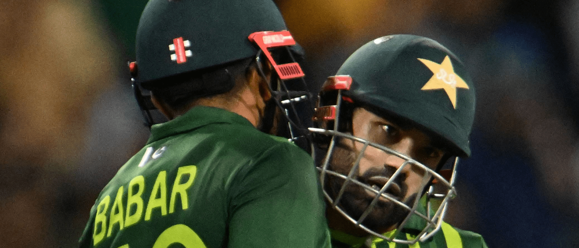 Pakistan's Captain Babar Azam celebrates after scoring a half-century with Pakistan's Muhammad Rizwan 1920x1080