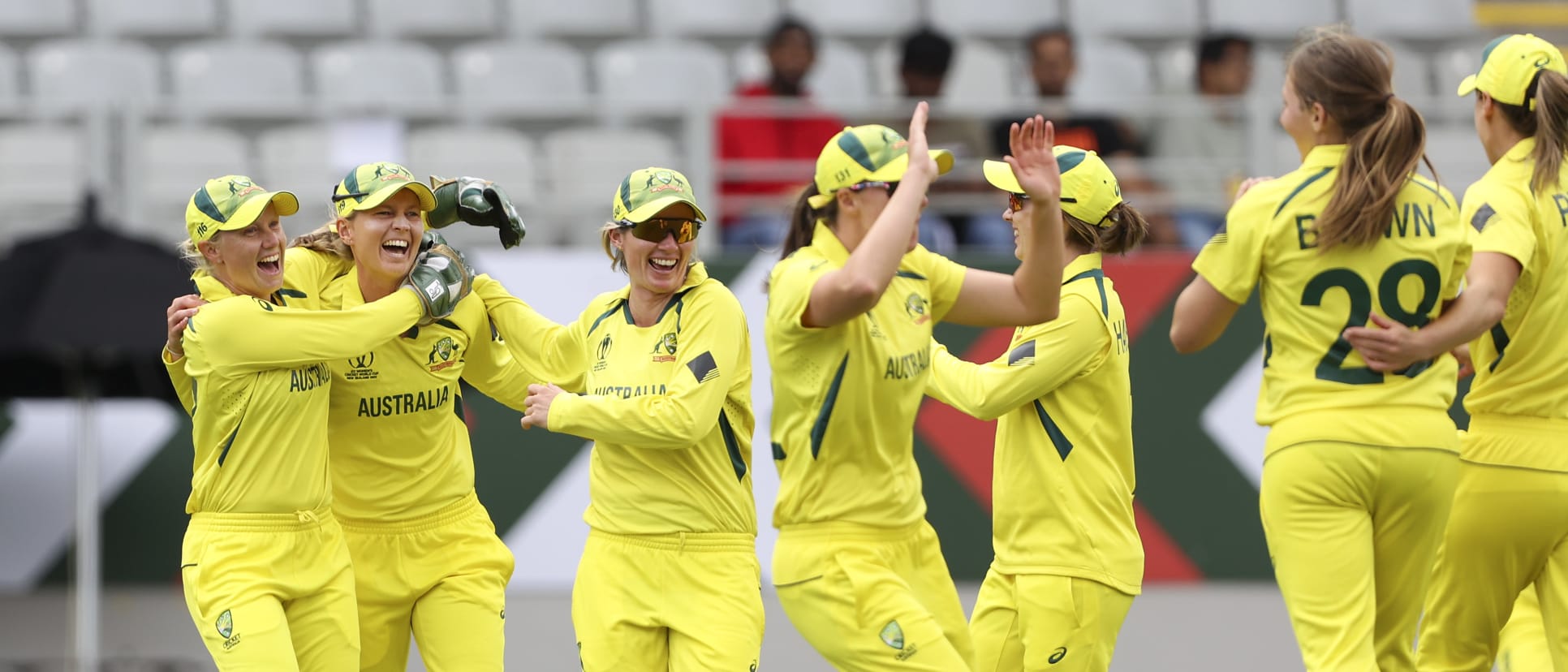 Australia celebrate the wicket of Smriti Mandhana of India during the 2022 ICC Women's Cricket World Cup match between India and Australia at Eden Park on March 19, 2022 in Auckland, New Zealand.