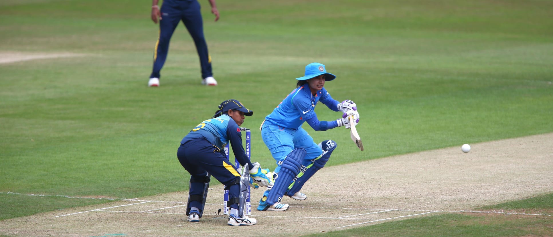 India held its nerve to overcome Sri Lanka by 16 runs after Deepti Sharma and Mithali Raj had put on 118 runs for the third wicket, which lifted India to 230 for seven.