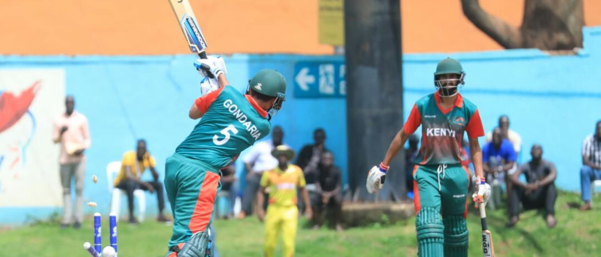 Kenya's Dhiren Gondaria is cleaned bowled by Uganda's Charles Waiswa