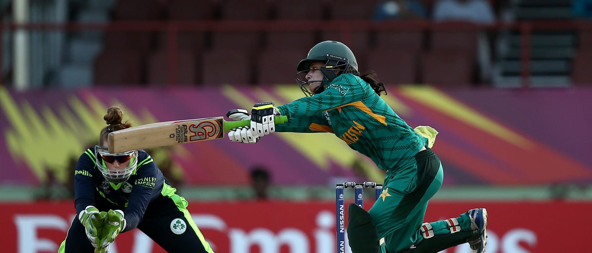 Javeria Khan of Pakistan bats with Mary Waldron, wicket keeper of Ireland looking on during the ICC Women's World T20 2018 match between Pakistan and Ireland at Guyana National Stadium on November 13, 2018 in Providence, Guyana.