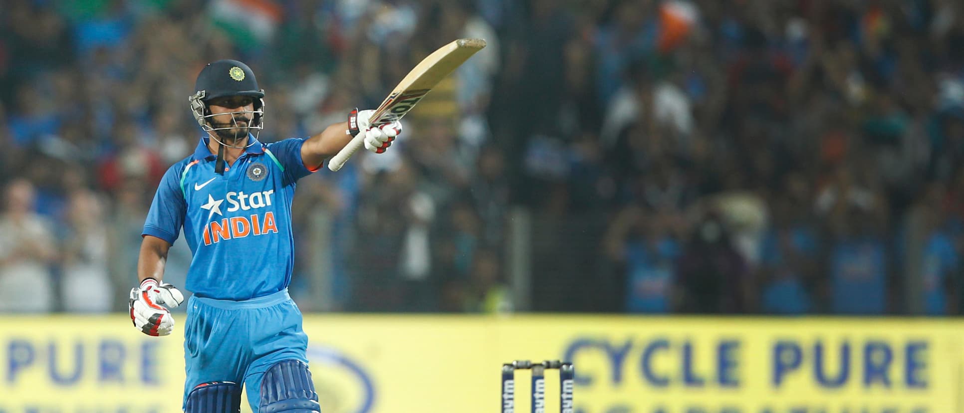 Kedar Jadhav celebrates his century against England in Pune